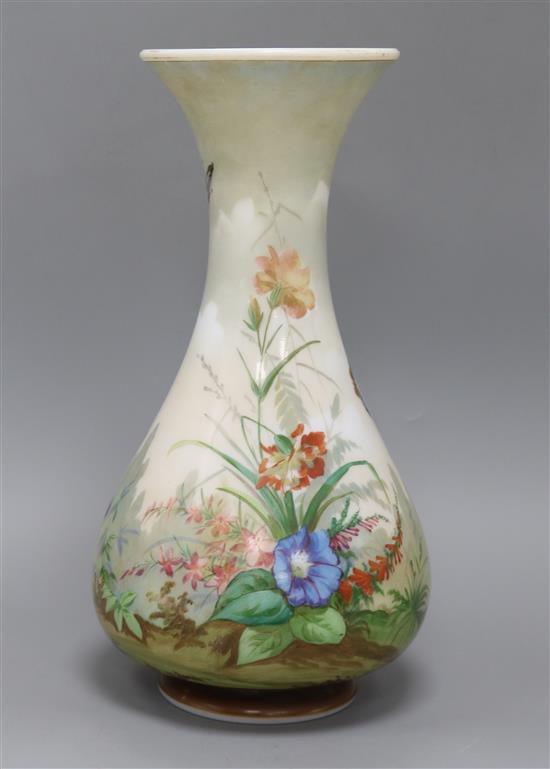 A 19th century large French enamelled white glass vase